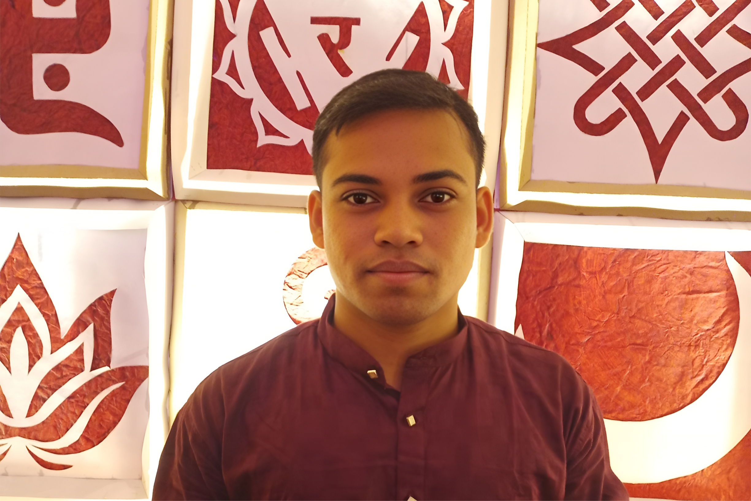 Manindra Roy working at a desk